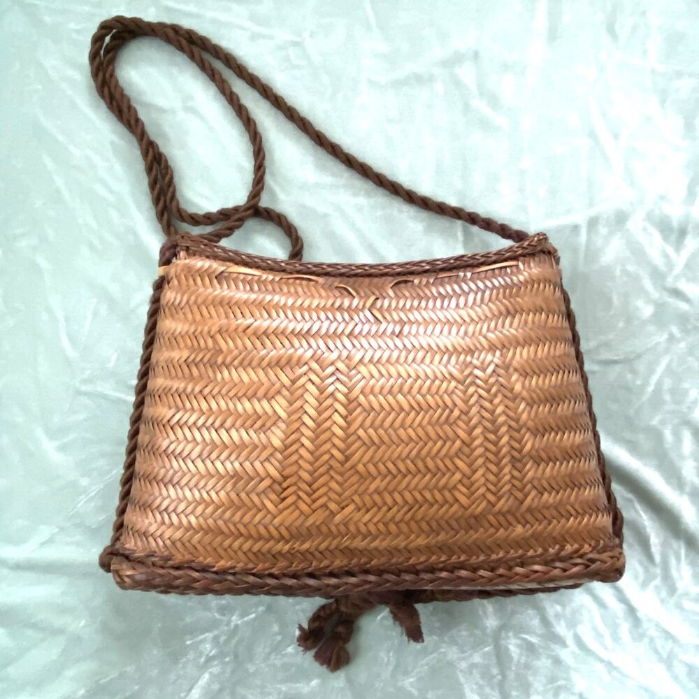 Upside-Down Woven Purse With a Brown Shoulder Strap